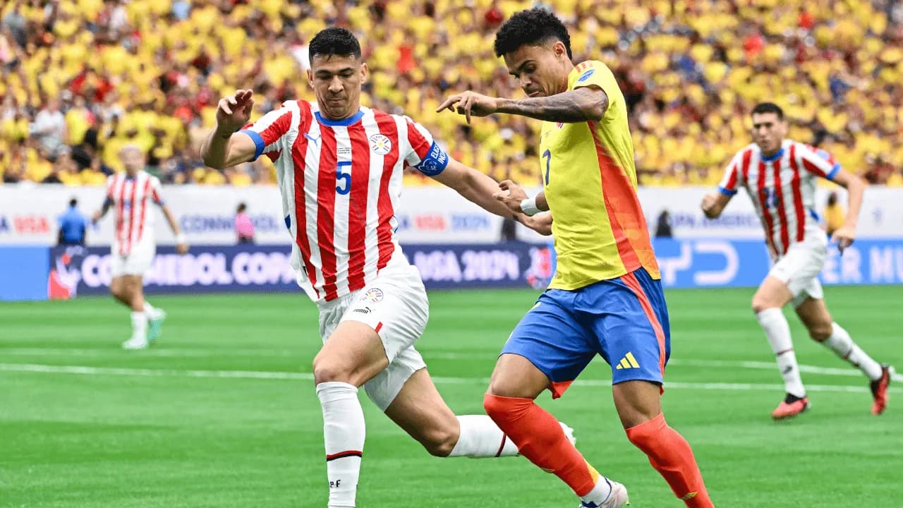 photologuephotos2025-03luis_diaz_regatea_ante_un_defensor_paraguayo_en_la_copa_america_2024png photologuephotos2025-03luis_diaz_regatea_ante_un_defensor_paraguayo_en_la_copa_america_2024png