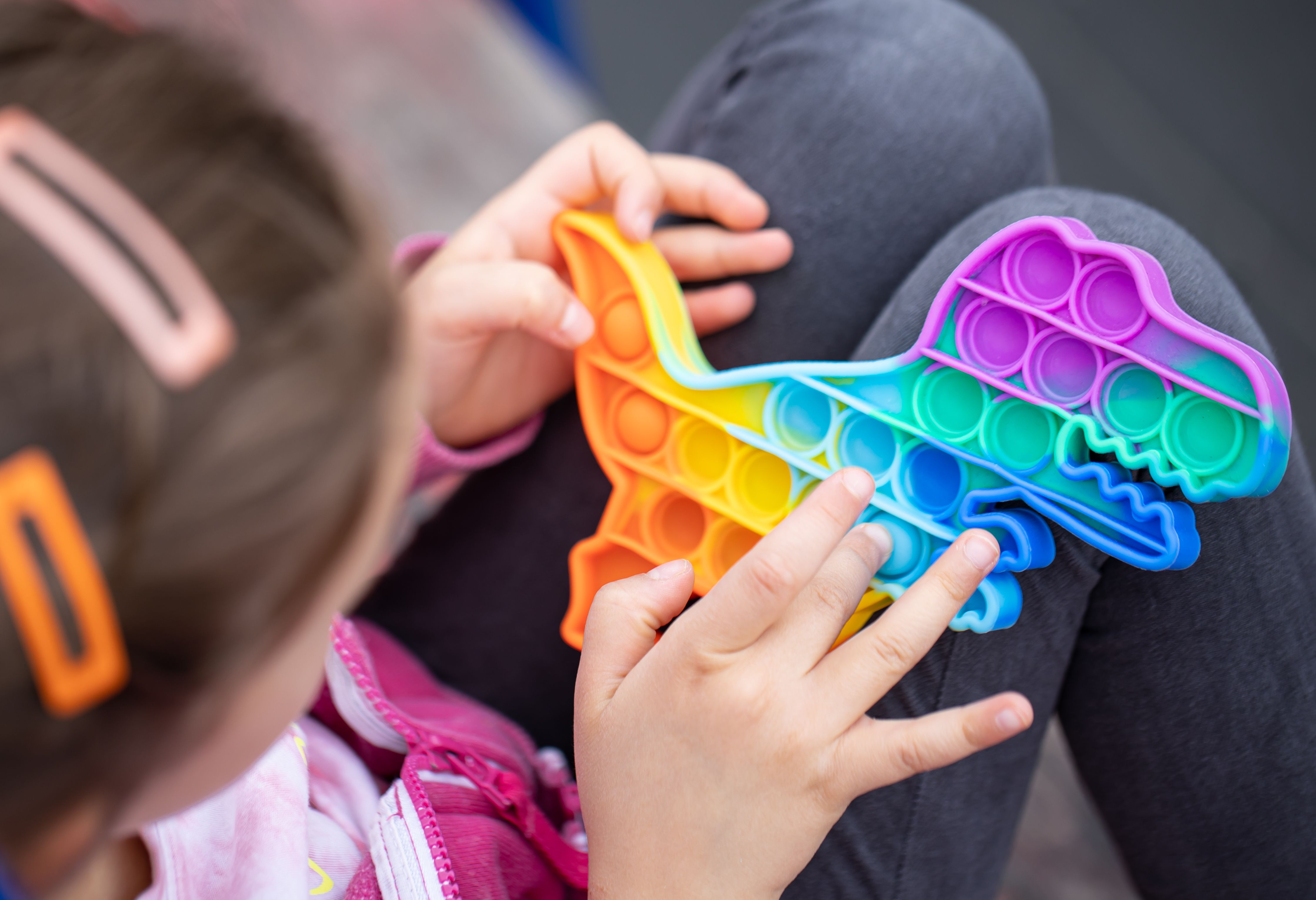 popular-colorful-anti-stress-touch-toy-dragon-shaped-fidgets-push-pop-it-hands-child_0.jpg